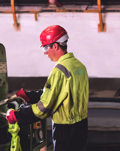 Lifting man at sling press