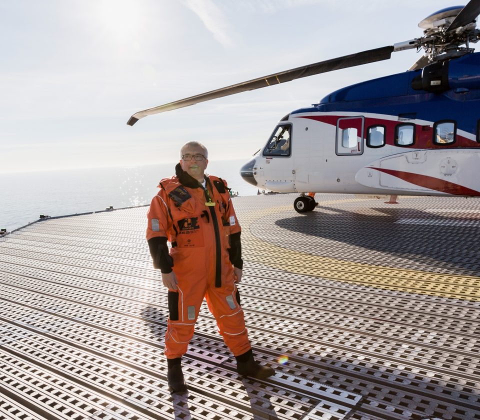 Helicopter on helideck with man edit no branding 3